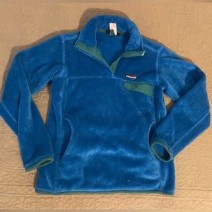Blue XS Patagonia pull over with green trim